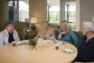 Seniors having lunch together